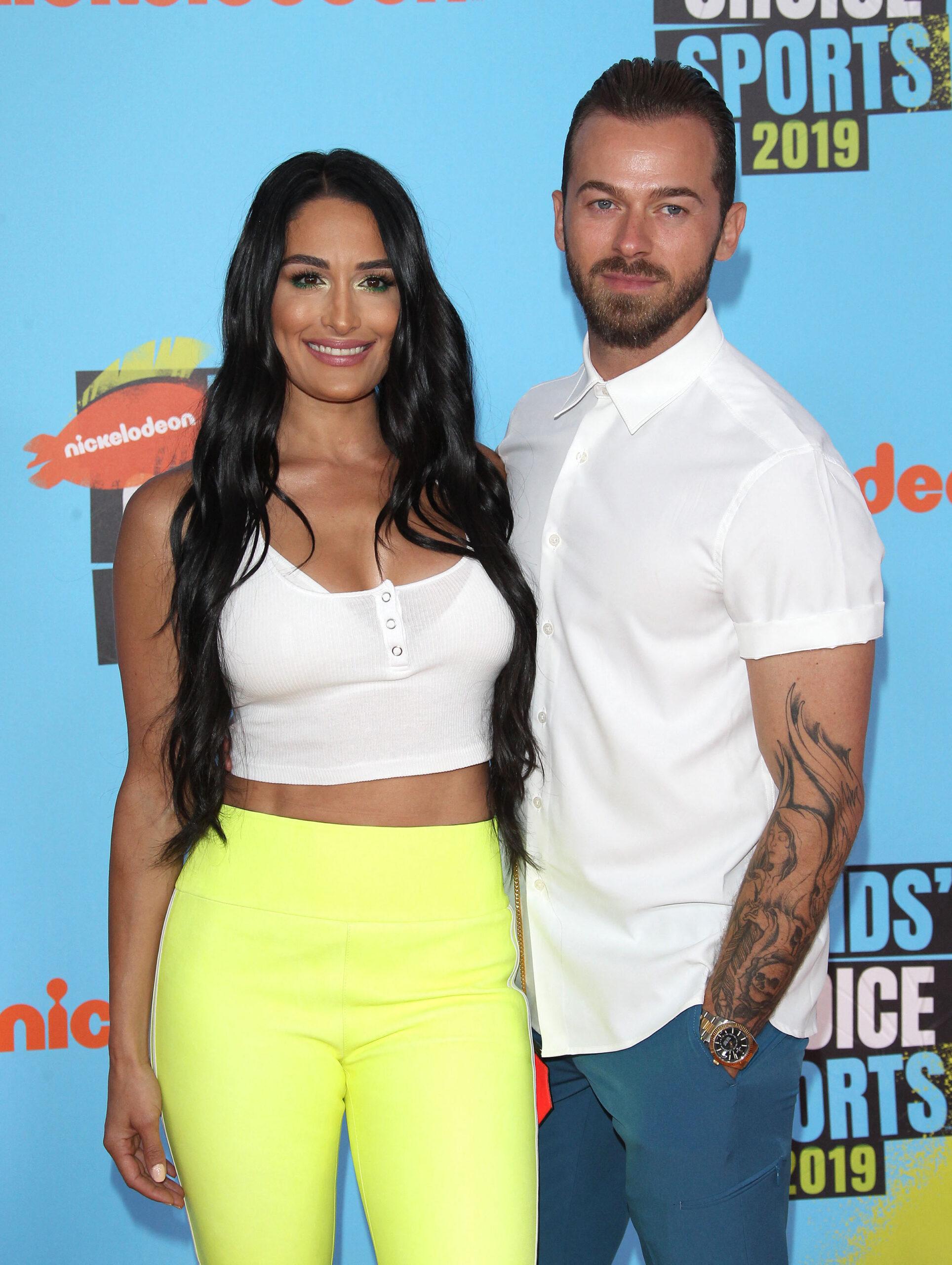 Nikki Garcia and Artem Chigvintsev at 2019 Nickelodeon Kids' Choice Sports Awards