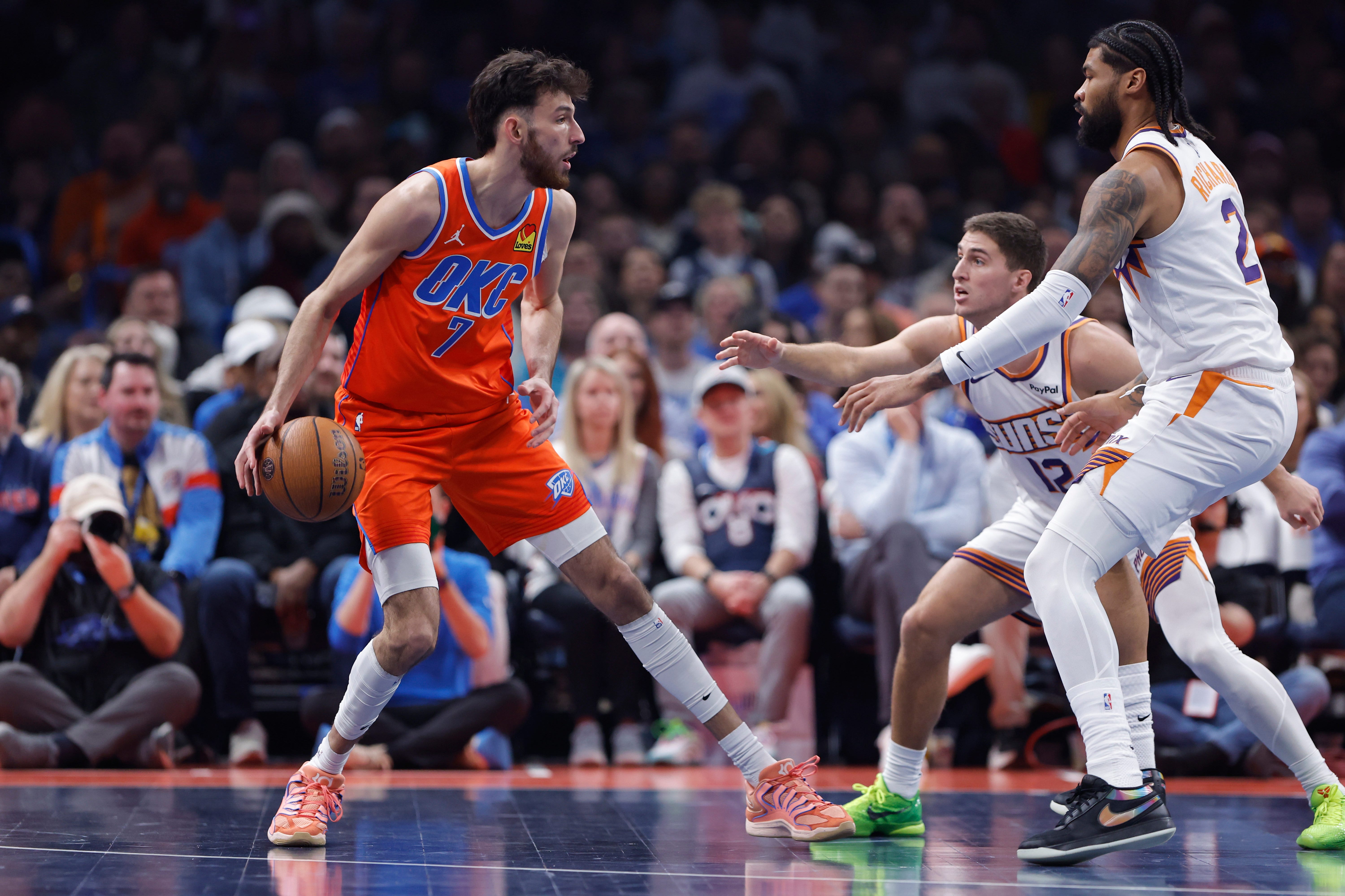Nov 28, 2025; Oklahoma City, Oklahoma, USA; Oklahoma City Thunder center Chet Holmgren (7) moves the ball against the Phoenix Suns during the second quarter at Paycom Center. Mandatory Credit: Alonzo Adams-Imagn Images
