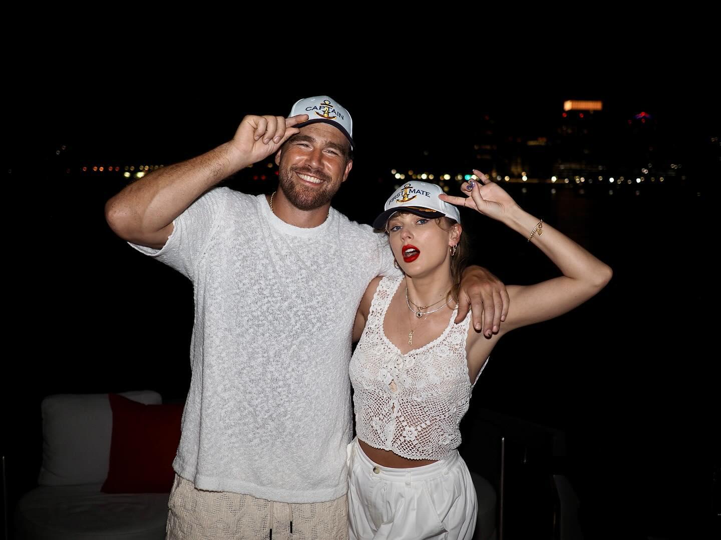 Travis Kelce poses with Taylor Swift
