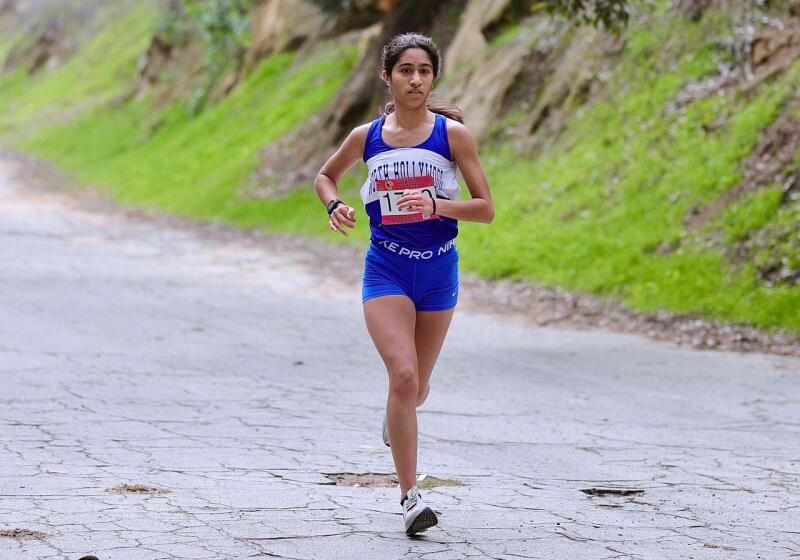 North Hollywood senior Ananya Balaraman races along the hilly cross-country course at Elysian Park.
