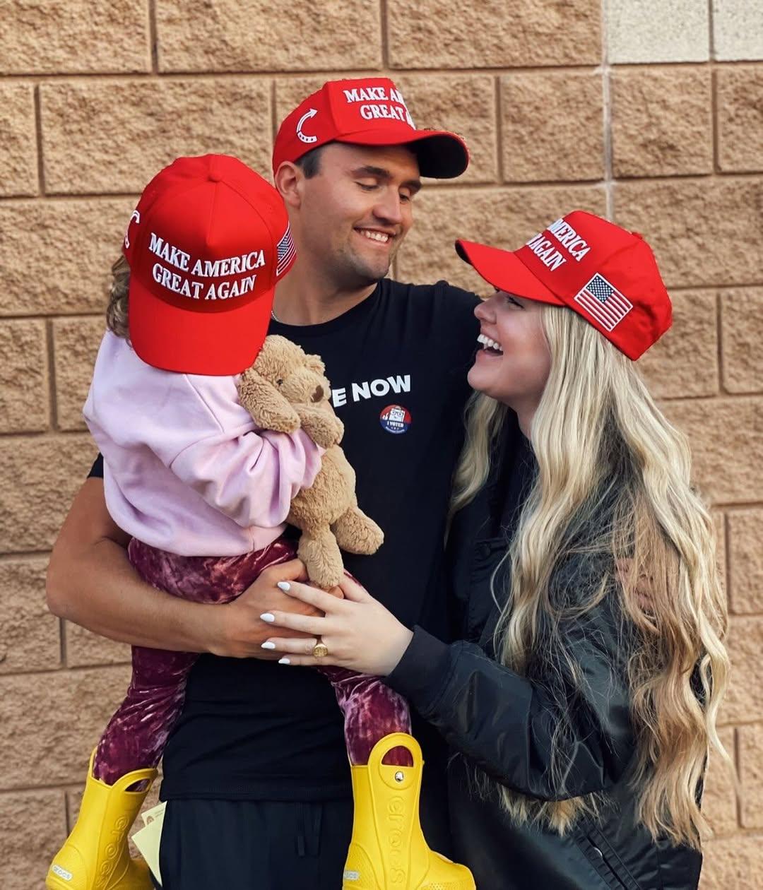 Charlie Kirk, Erika Kirk, and daughter wearing MAGA hats