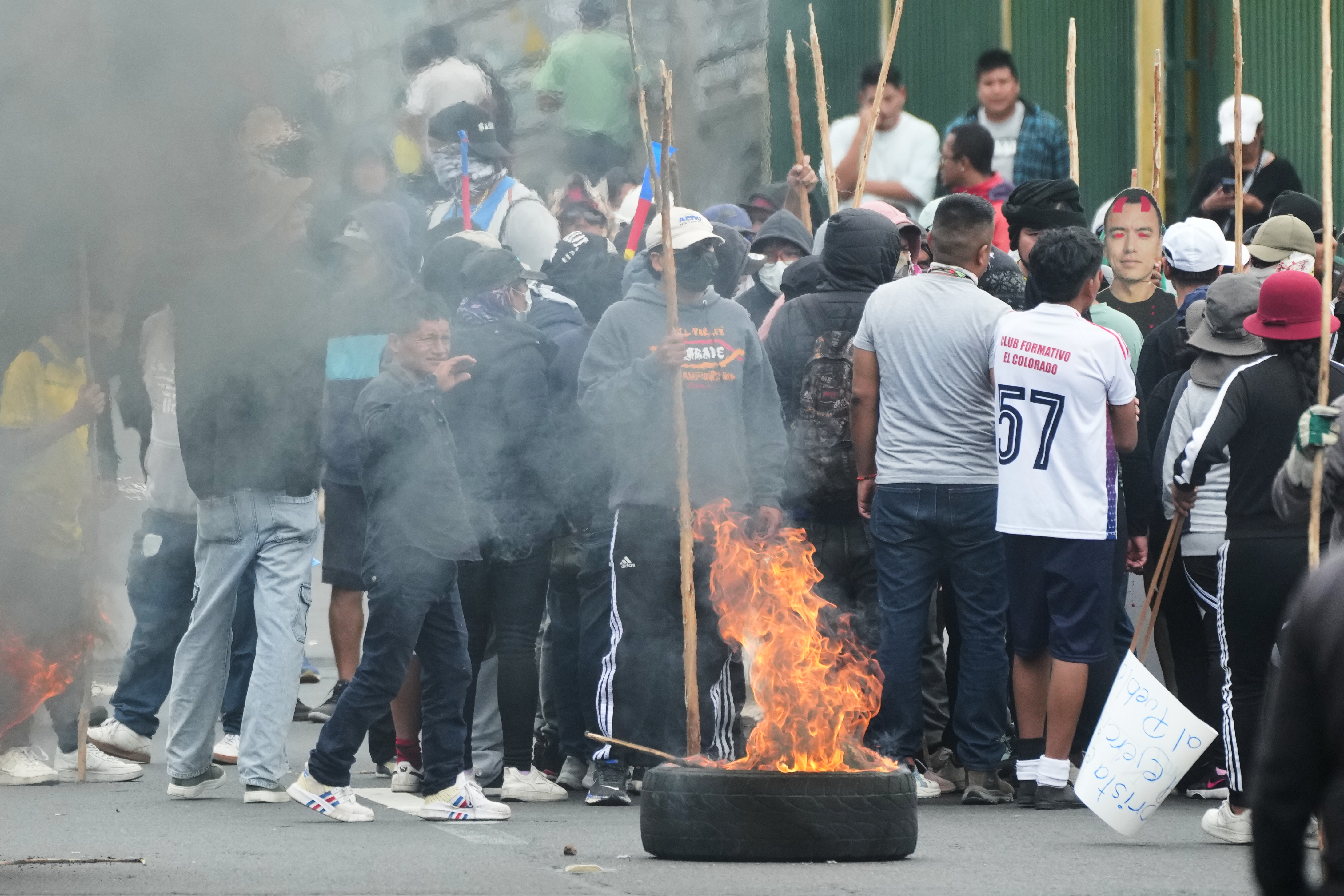 Demonstrators protest the elimination of the diesel subsidy by President Daniel Noboa's government, in Calderon, Ecuador, Thursday, Oct. 9, 2025. (AP Photo/Dolores Ochoa)