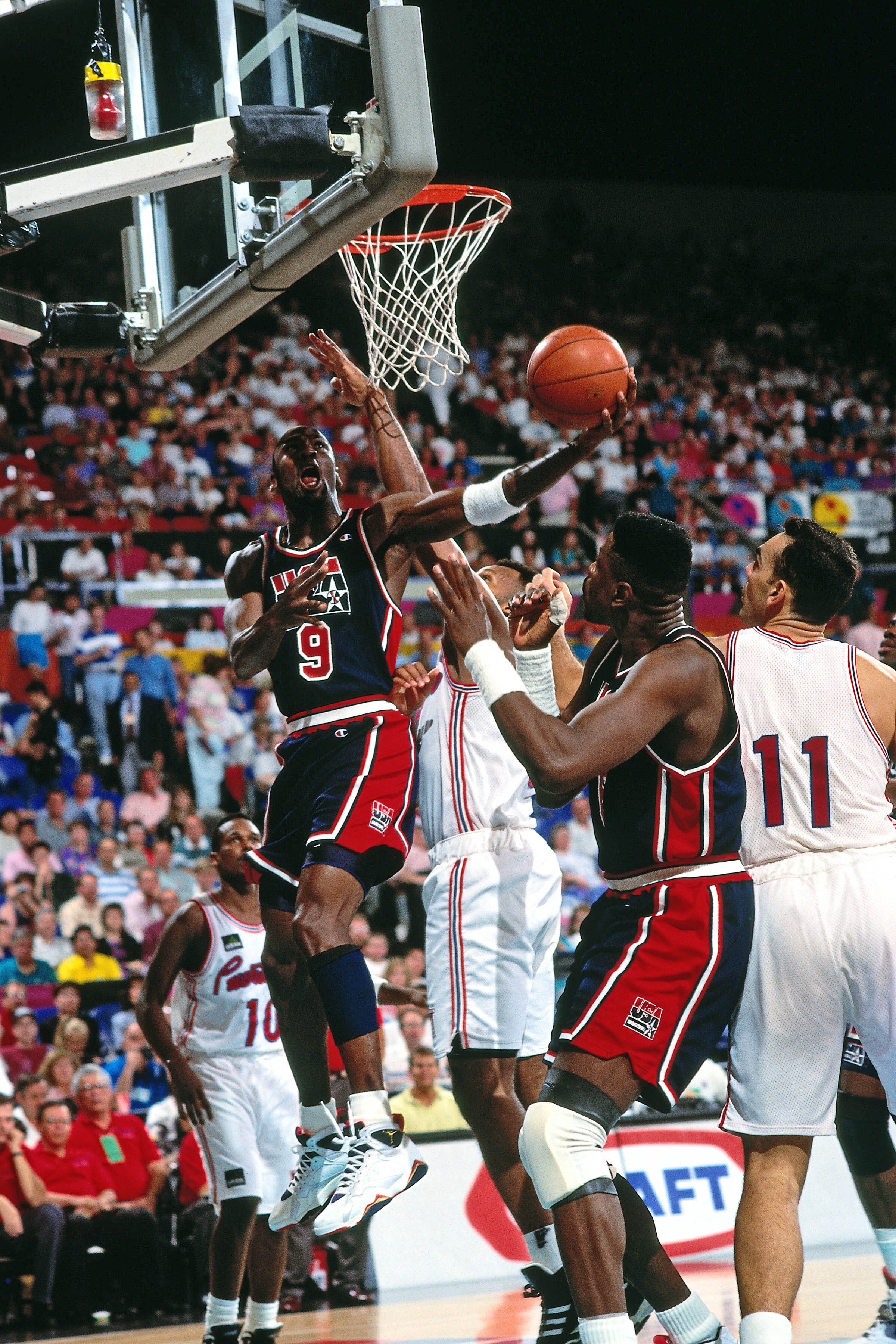 PORTLAND, OR - CIRCA 1992: Michael Jordan #9 of the United States Senior Men's team shoots against Puerto Rico during the 1992 Basketball Tournament of Americas at the Veterans Memorial Coliseum circa 1992 in Portland, Oregon. NOTE TO USER: User expressly acknowledges and agrees that, by downloading and or using this photograph, User is consenting to the terms and conditions of the Getty Images License Agreement. Mandatory Copyright Notice: Copyright 1992 NBAE (Photo by Brian Drake/NBAE via Getty Images)