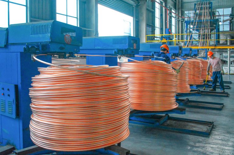 Copper rods are wound at a workshop which recycles copper in Anqing, in China&rsquo;s eastern Anhui province on July 11, 2025. (Photo by AFP) / CHINA OUT