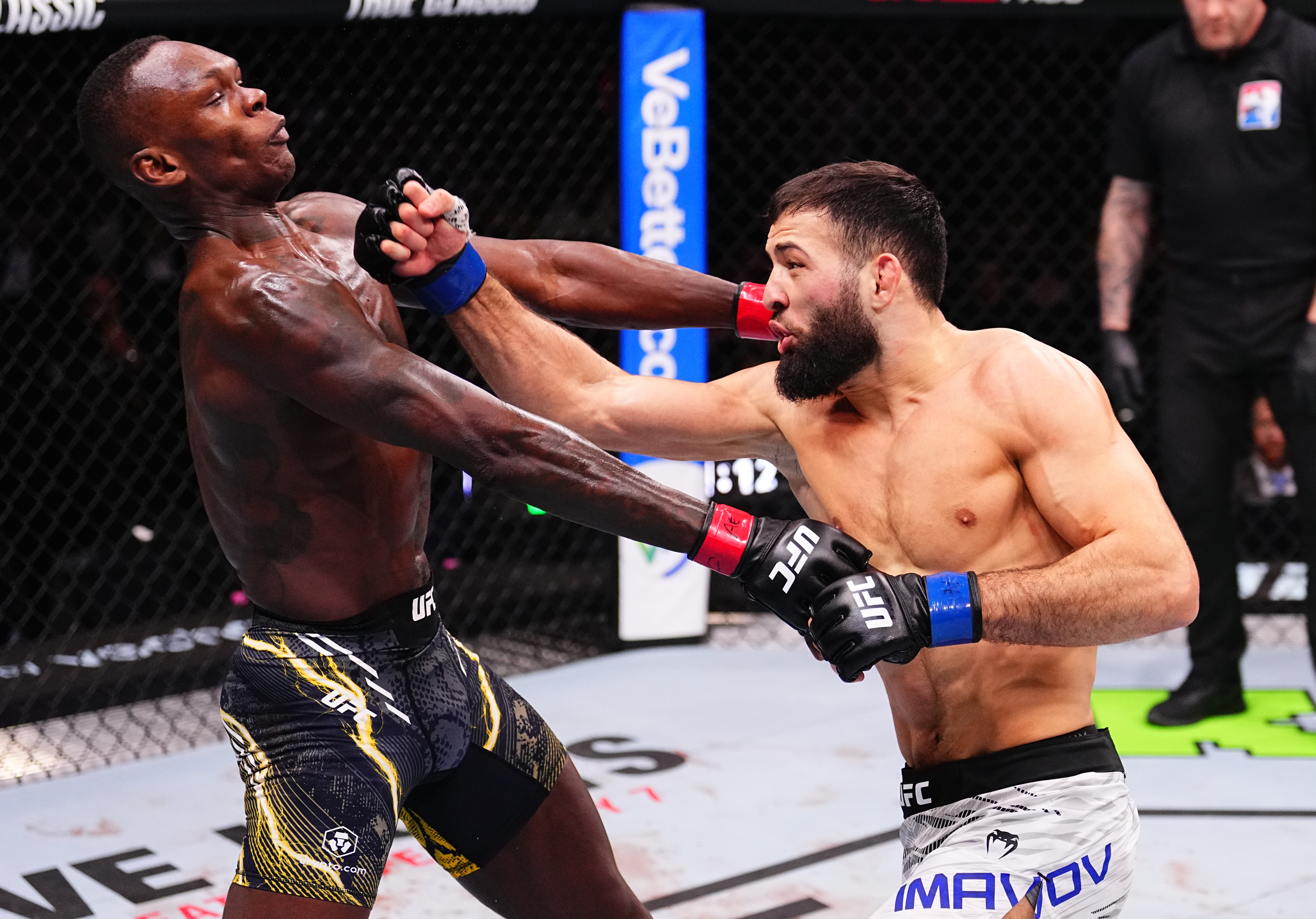 RIYADH, SAUDI ARABIA - FEBRUARY 01: (R-L) Nassourdine Imavov of Russia punches Israel Adesanya of Nigeria in a middleweight fight during the UFC Fight Night event at anb Arena on February 01, 2025 in Riyadh, Saudi Arabia. (Photo by Chris Unger/Zuffa LLC)