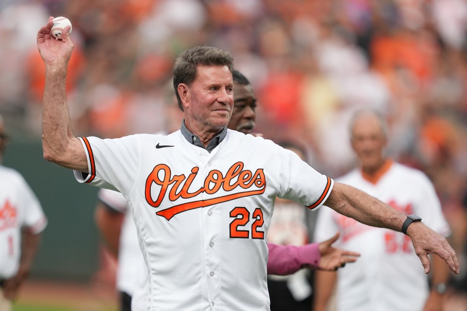 BALTIMORE, MD - AUGUST 05: Former Baltimore Orioles player Jim Palmer throws out the first pitch during the fourth anniversary of their World Series win before a baseball game against the New York Mets at Oriole Park at Camden Yards on August 5, 2023 in Baltimore, Maryland. (Photo by Mitchell Layton/Getty Images)