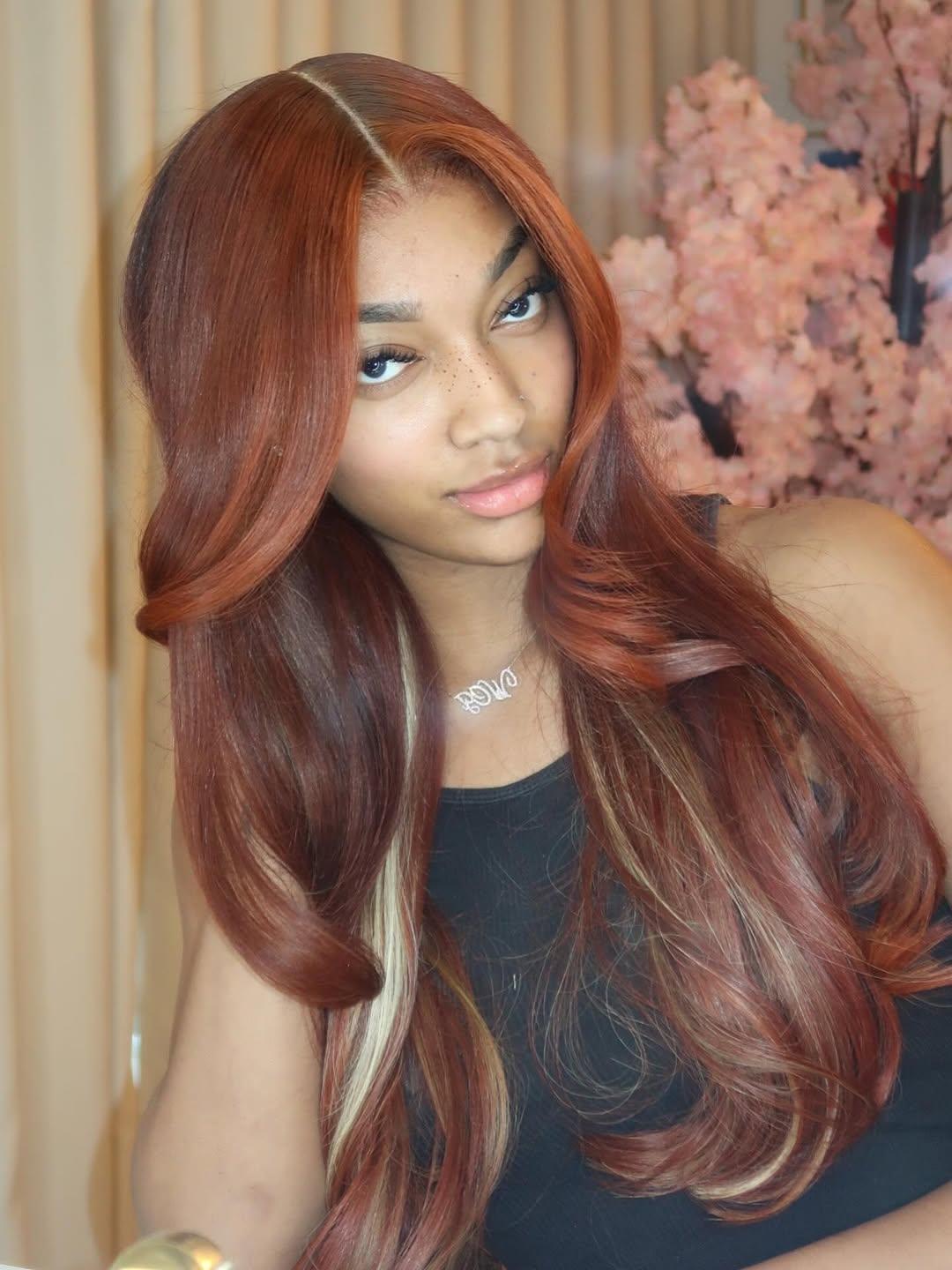 Angel Reese posing for a picture.