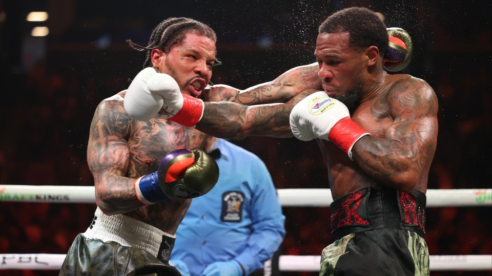 NEW YORK, NEW YORK - MARCH 01: Gervonta Davis exchanges punches with Lamont Roach Jr. during their bout for Davis' WBA lightweight title at Barclays Center on March 01, 2025 in New York City. (Photo by Al Bello/Getty Images)