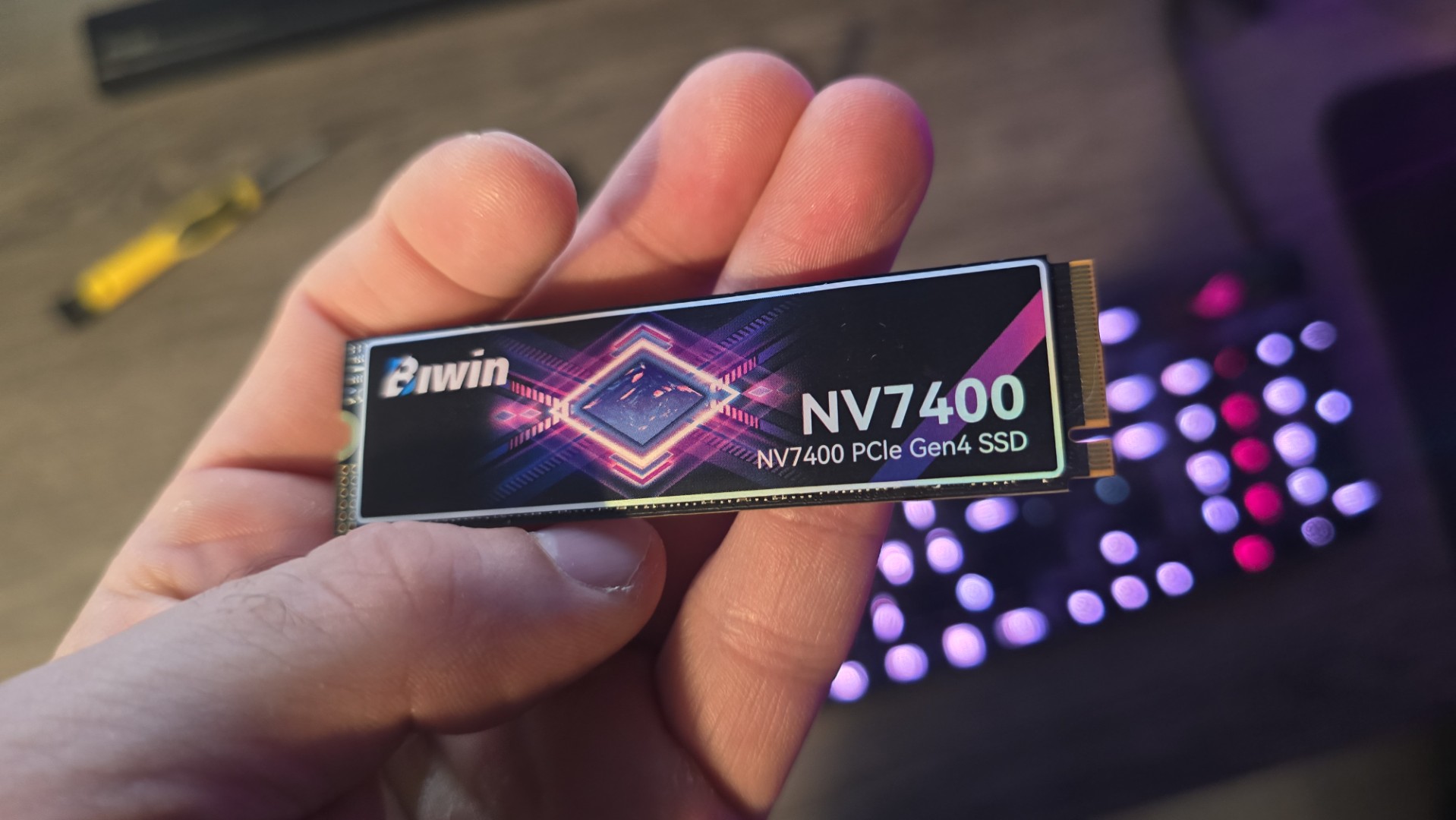 The Biwin Black Opal NV7400 SSD out of its packaging and installed in a PC.