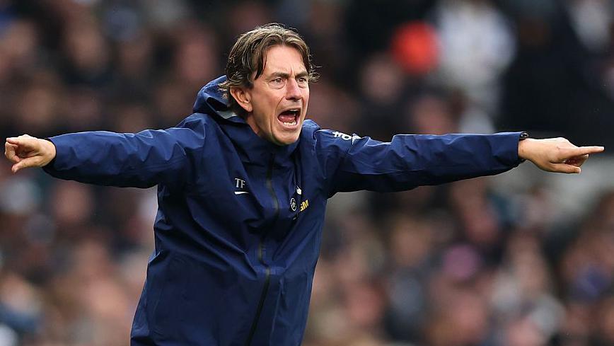 Tottenham manager Thomas Frank points and shouts